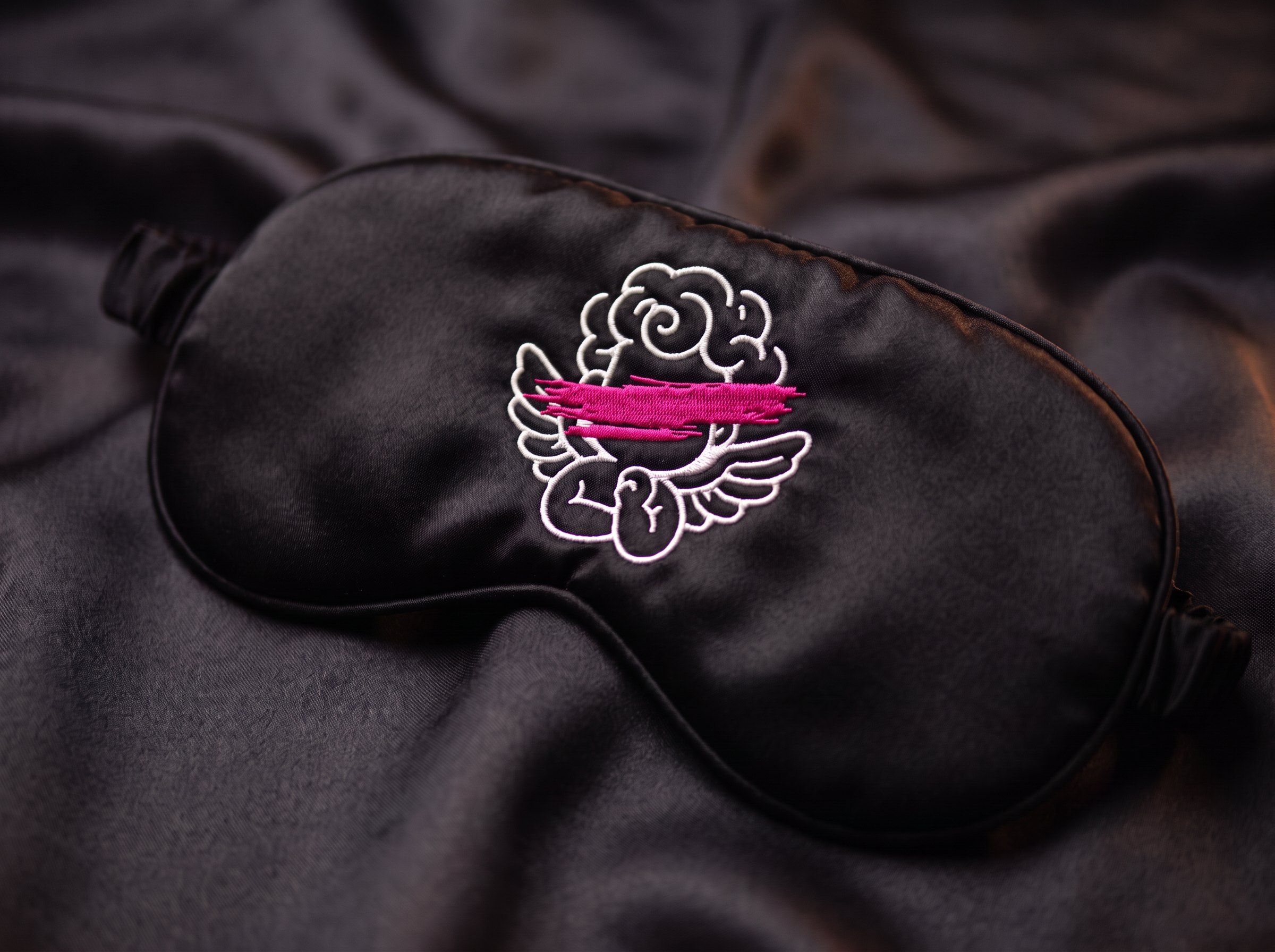 An embroidered silk blindfold - for the blindfold dares